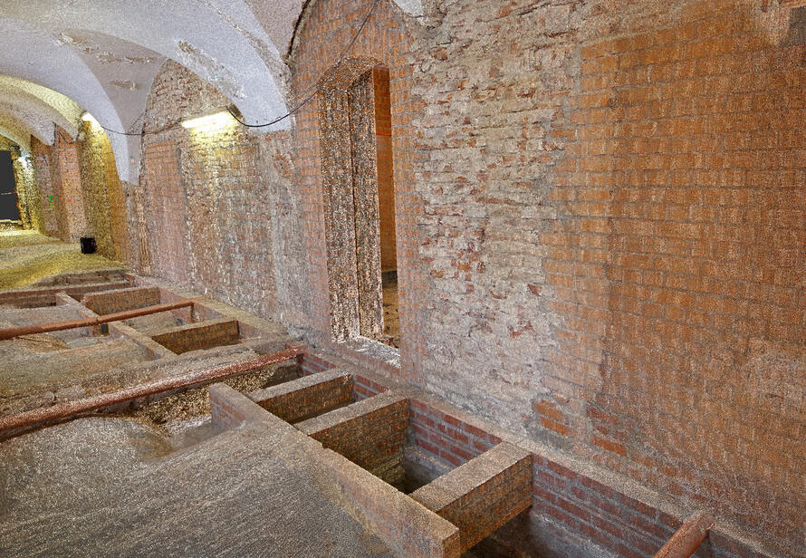 Detailansicht einer 3D Punktwolke mit Fokus auf Mauerwerk, Gewölbe und Bodenstruktur eines historischen Gebäudes, aufgenommen für die Bauplanung.