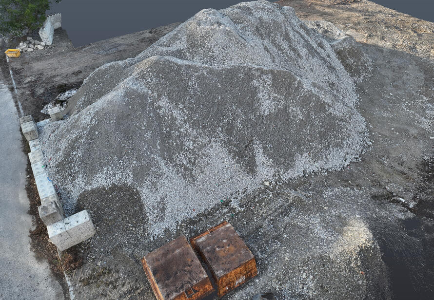 3D Punktwolke eines Haufwerks aus der Drohnenvermessung, realitätsnahe Darstellung zur genauen Mengenermittlung und Dokumentation.