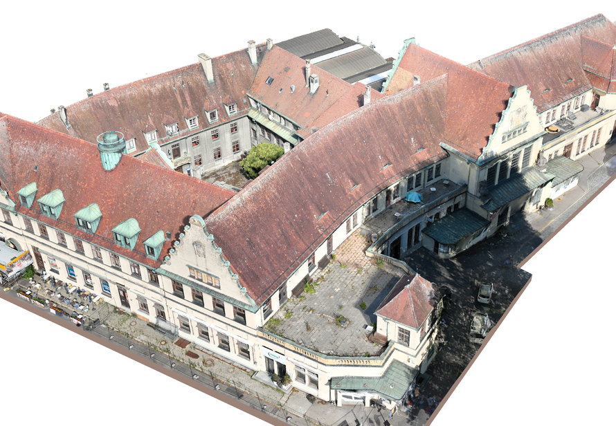 Aus rund 1600 Drohnenbildern wurde ein detailliertes 3D Mesh des Bahnhofs Lindau erstellt. Das Modell bildet Dachflächen, Fassaden und Gebäudestrukturen digital ab.